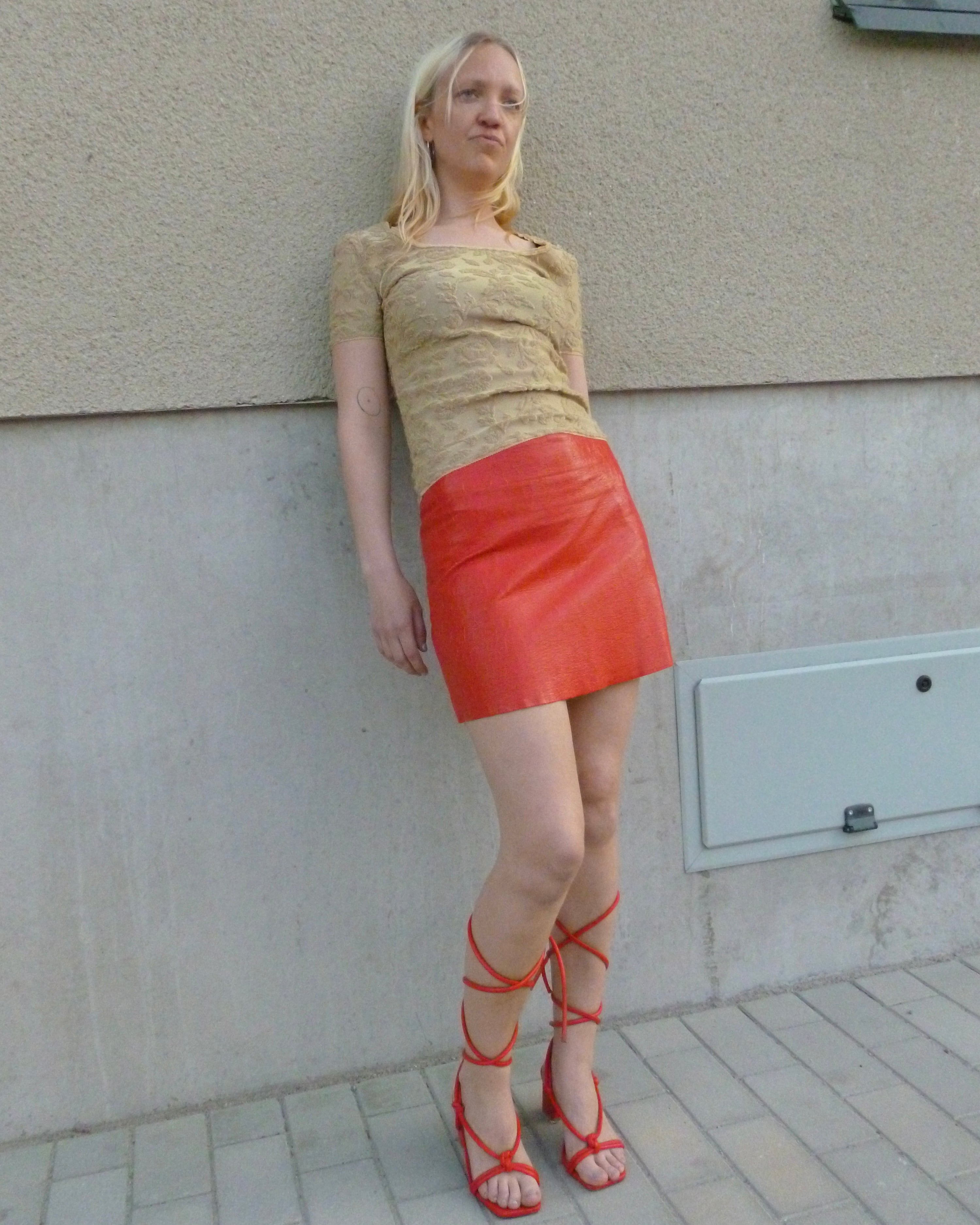 glossy patent mini skirt