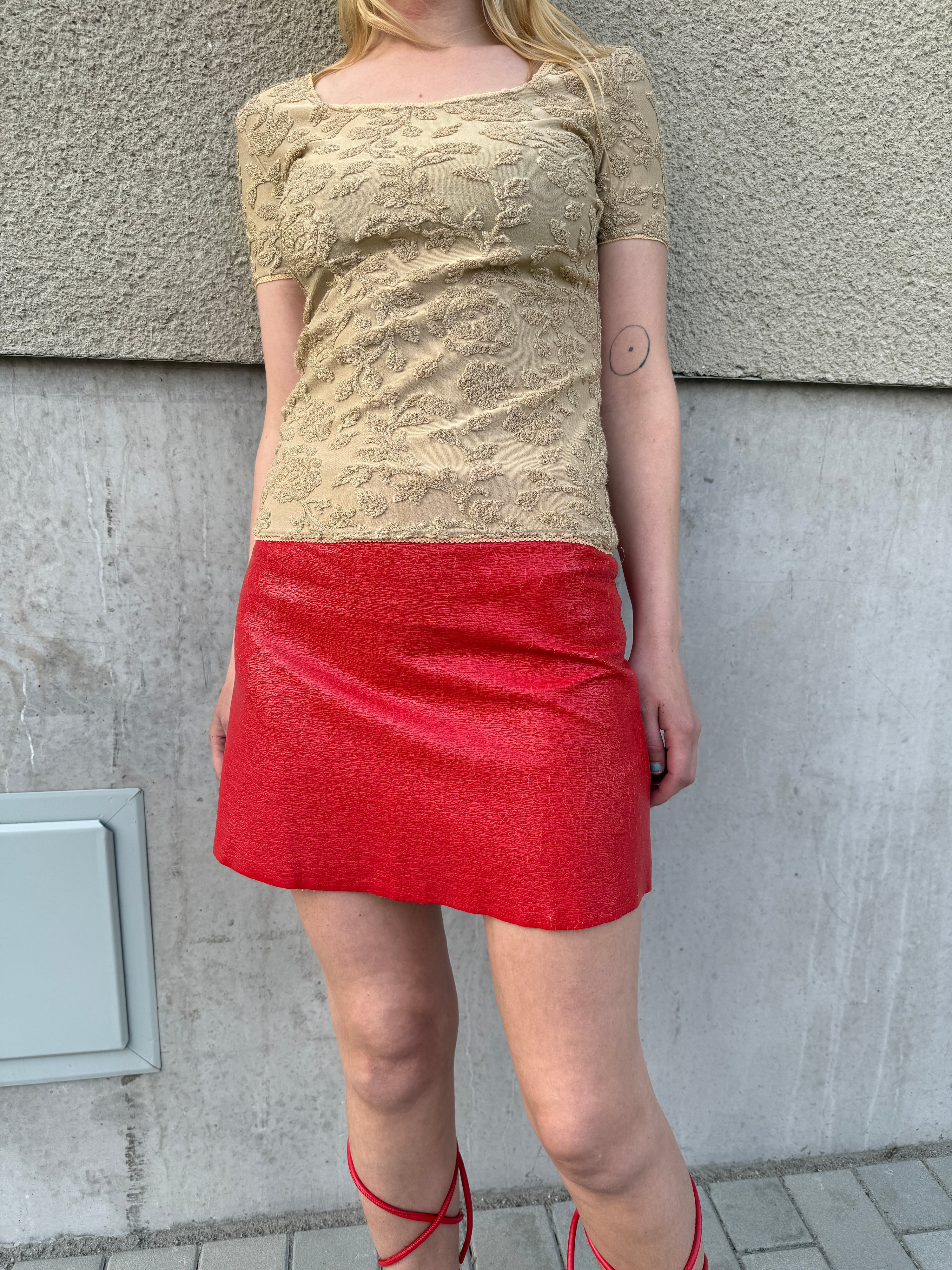 glossy patent mini skirt