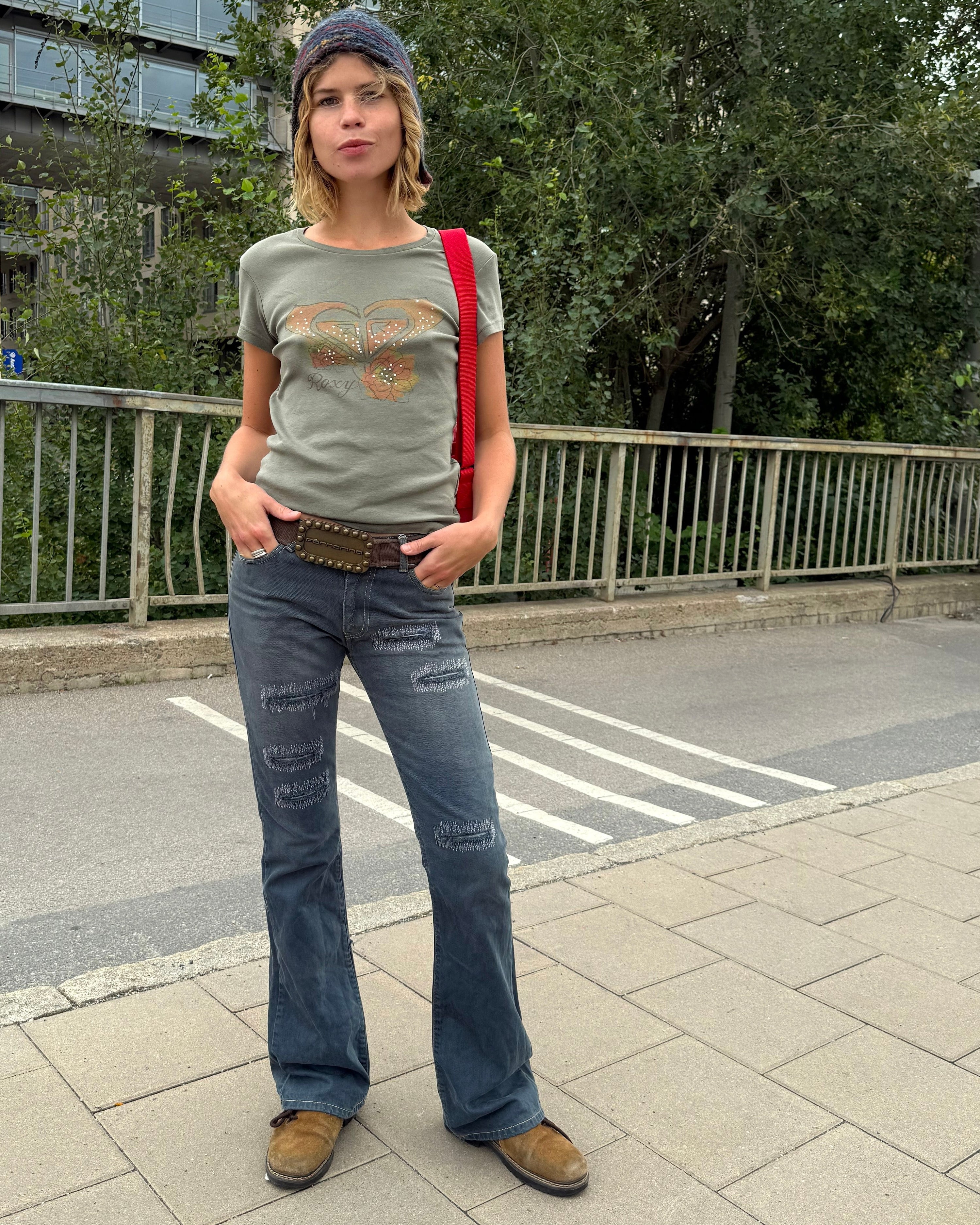 tight flared jeans w stitch holes