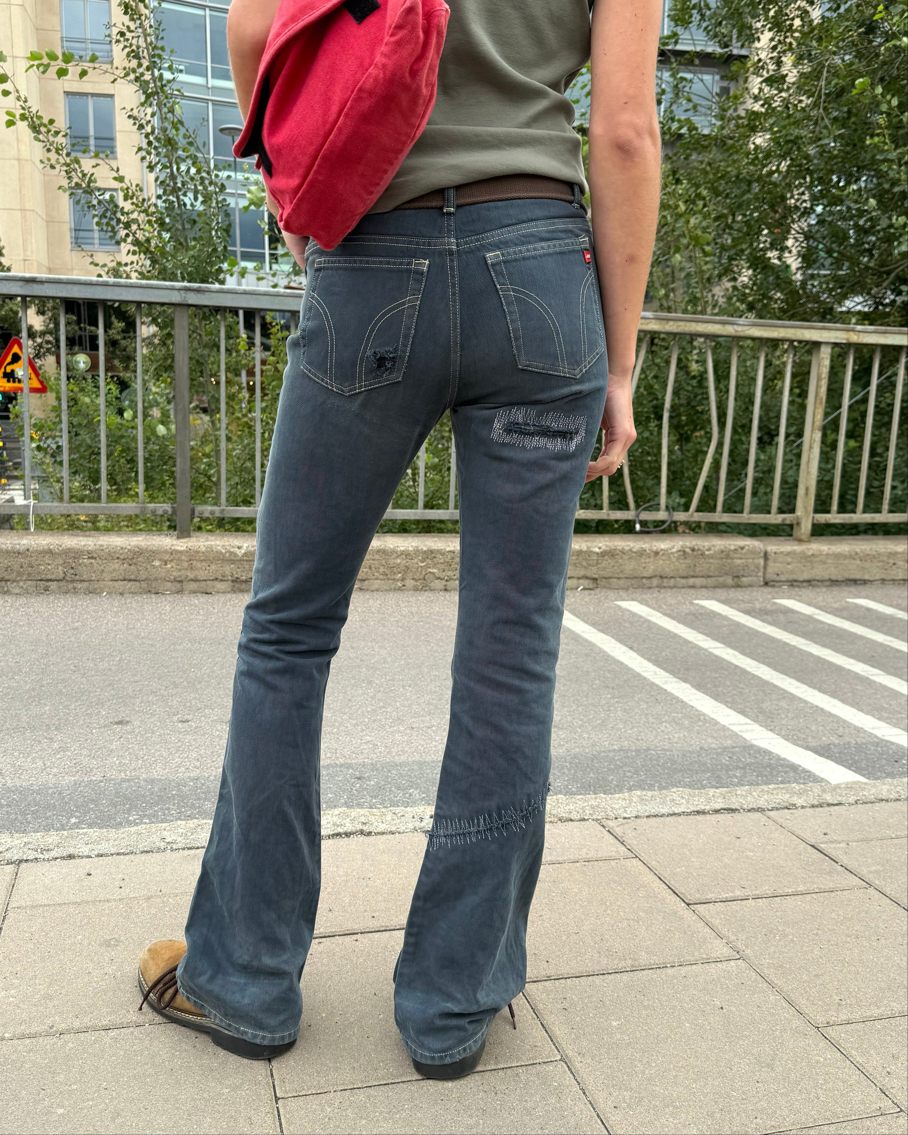 tight flared jeans w stitch holes