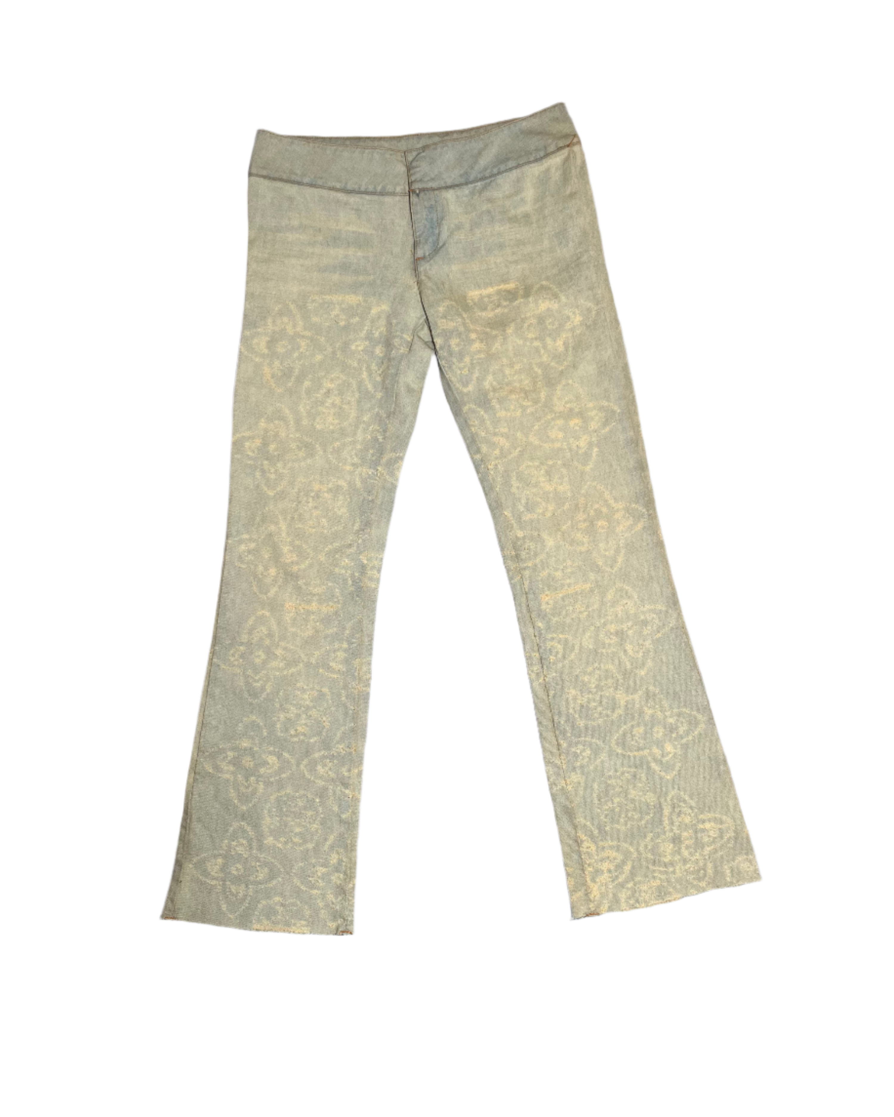 low waisted distressed medallion print flared jeans