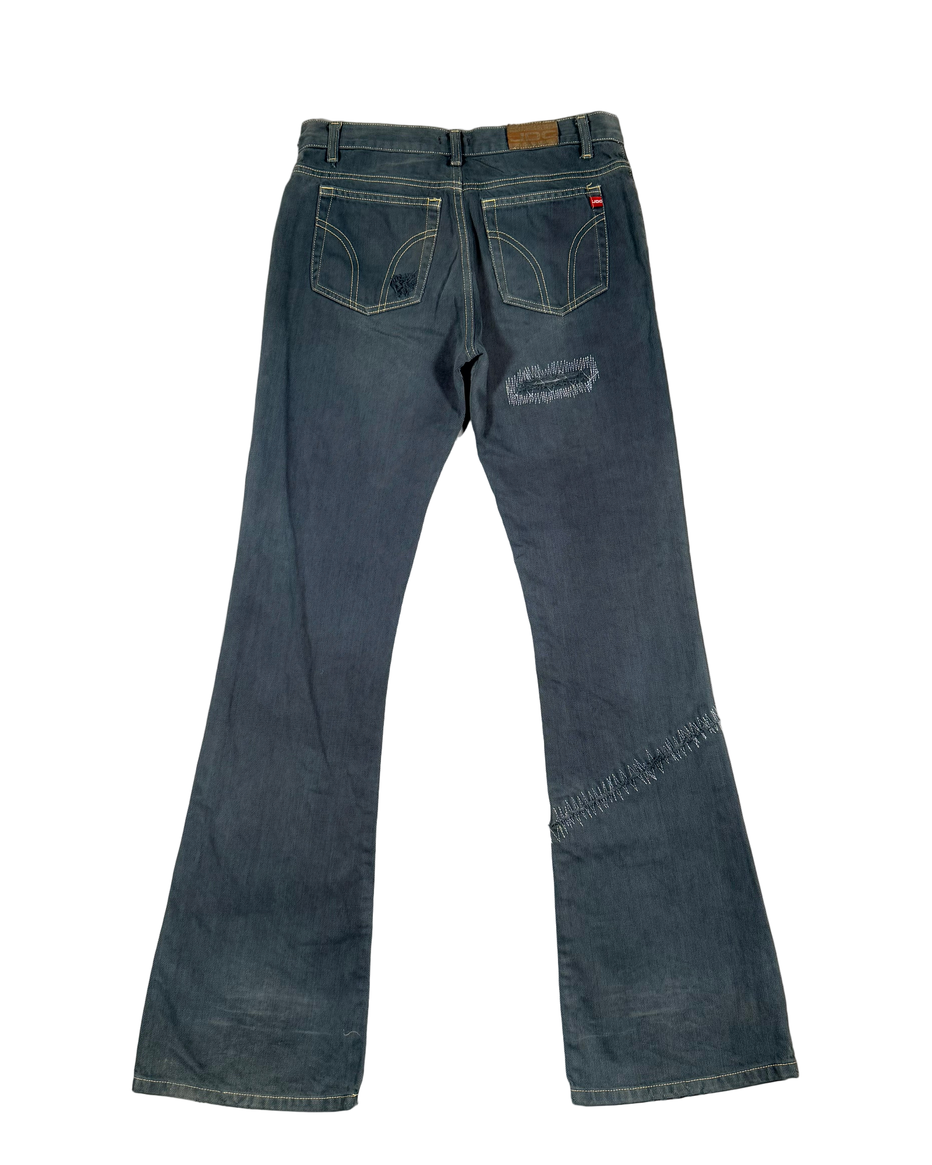 tight flared jeans w stitch holes